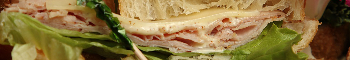 Eating Sandwich at Best Sub Shop restaurant in Miami, FL.